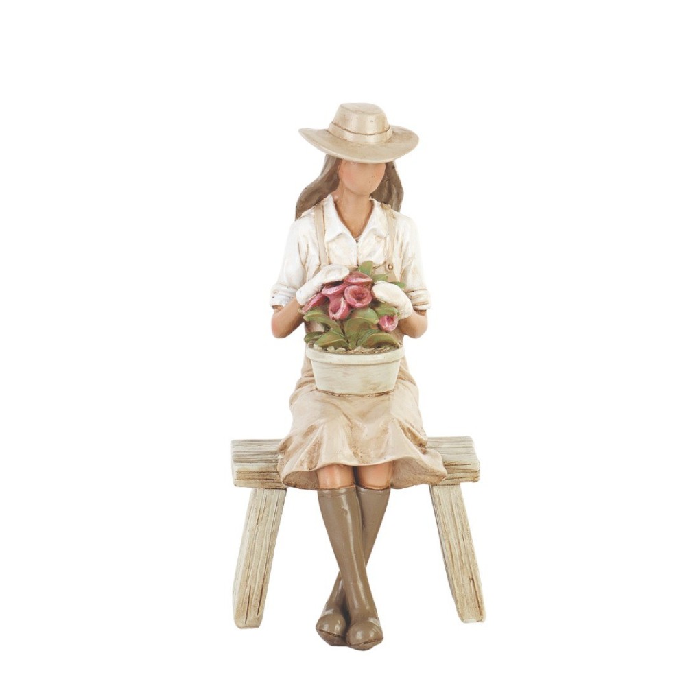 RAGAZZA SEDUTA CON CESTINO FIORI